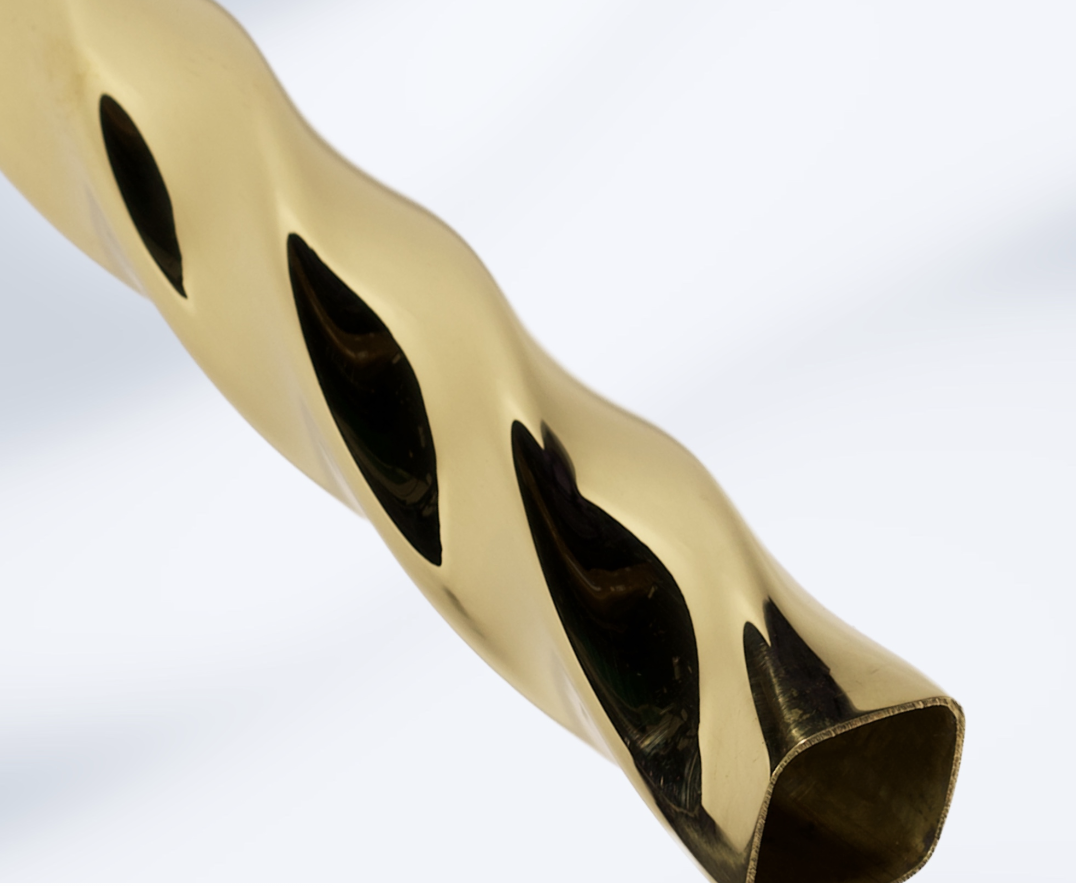 Mirror polished brass twisted tube by Timeless with a barley style twist