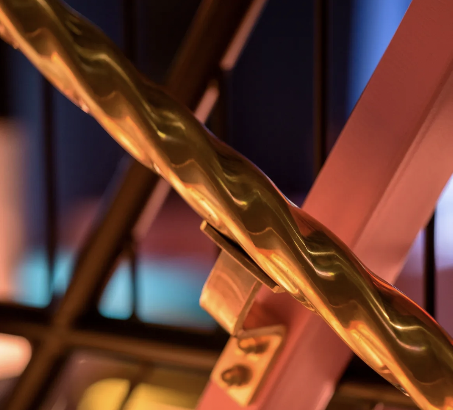 Timeless's unique twisted brass tube used in innovative fairground handrail feature