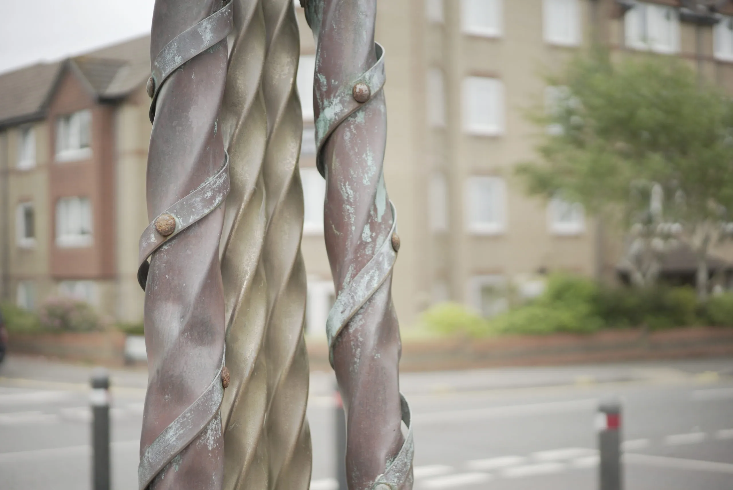 Ornate brass maritime sculpture made from brass twisted square tubing on display in Bournemouth 